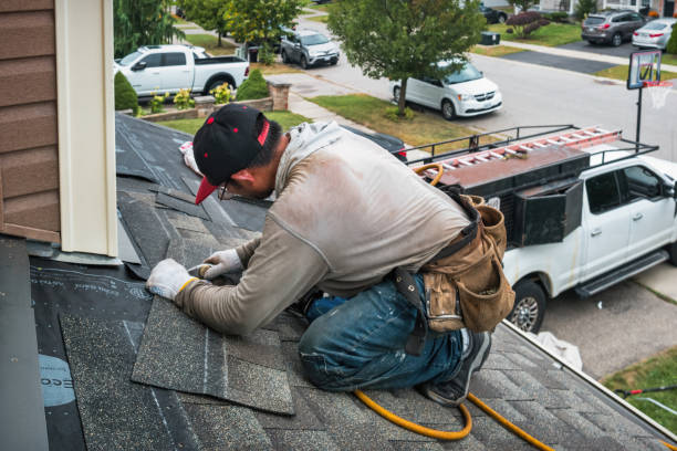 Professional Roofing technician working in Bradley, OK